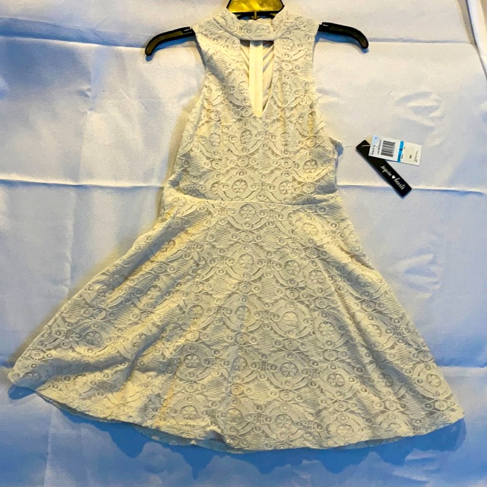 This is a short semi- formal/ formal dress.